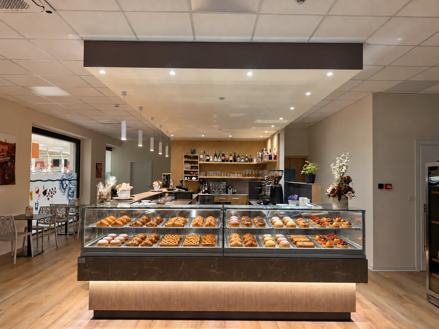 Il banco di Faraone Cafè con un allestimento illustrativo di brioche e dolci